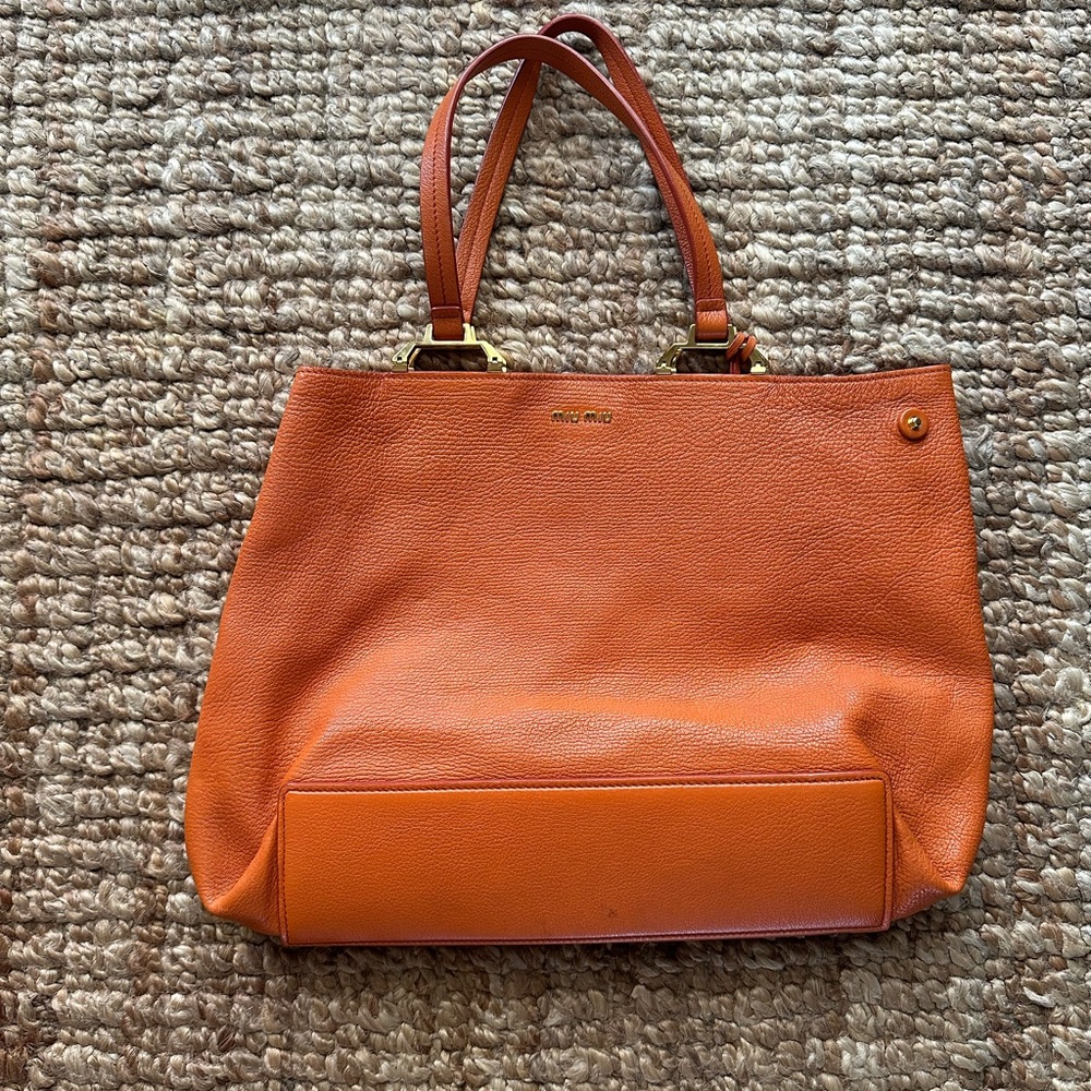 Miu Miu Orange Shoulder Bag with Minimalist Design